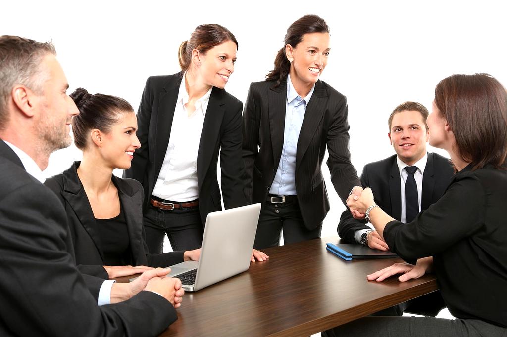 Financial coach reviewing a household budget plan together with a client